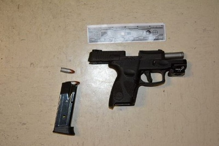 Toronto police say a loaded handgun as well as a loaded rifle were found inside a vehicle during a traffic stop. 