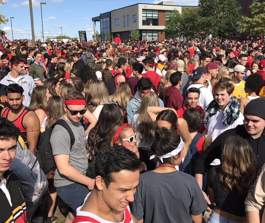 Guelph police say an estimated 7,000 people showed up to an unsanctioned street party on Chancellors Way on Saturday during Homecoming celebrations.