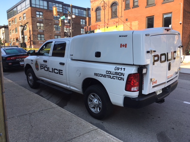 Hamilton police have charged two men following a two-vehicle collision that took place in mid-March.