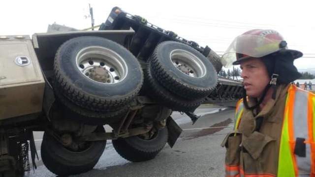 UPDATED: Truck topples over near Armstrong - image