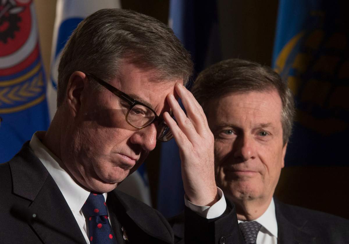 Ottawa Mayor Jim Watson and Toronto Mayor John Tory are seen during a news conference at the Federation of Canadian Municipalities meetings in Ottawa on Friday, January 20, 2017.