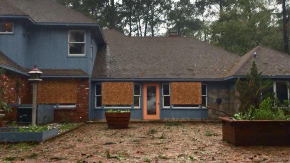 April McCreary’s father Jimmy’s boarded up home in Morehead City, North Carolina.