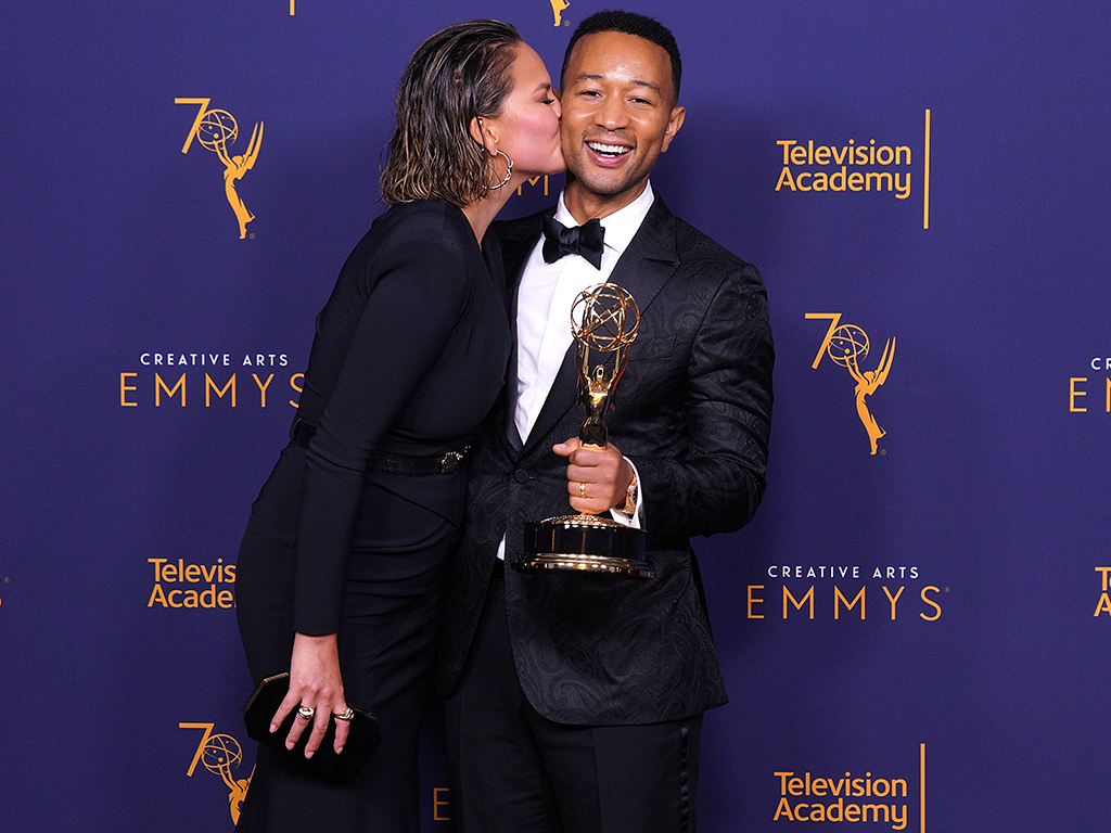 John Legend, winner of the award for outstanding variety special for 'Jesus Christ Superstar Live in Concert', and wife Chrissy Teigen during the 2018 Creative Arts Emmy Awards on Sunday.