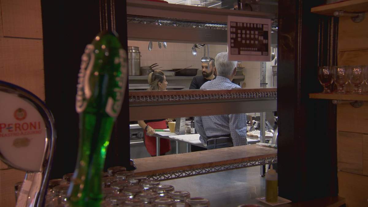 Anna Giampà,Matteo Fiorilli and his father, Eduardo, in the kitchen.