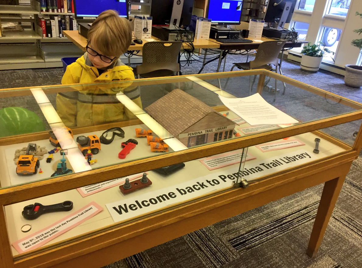 A youngster checks out a new display at Pembina Trails Library on Monday, Sept. 24, 2018.