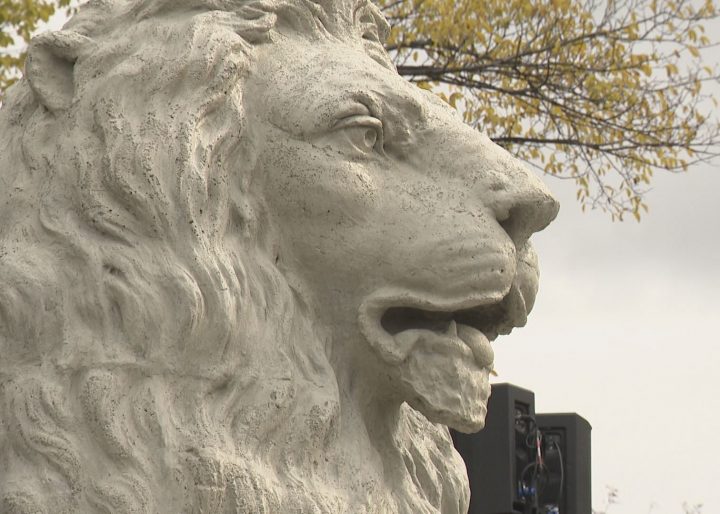 An iconic Centre Street lion sculpture found a new home in Rotary Park.