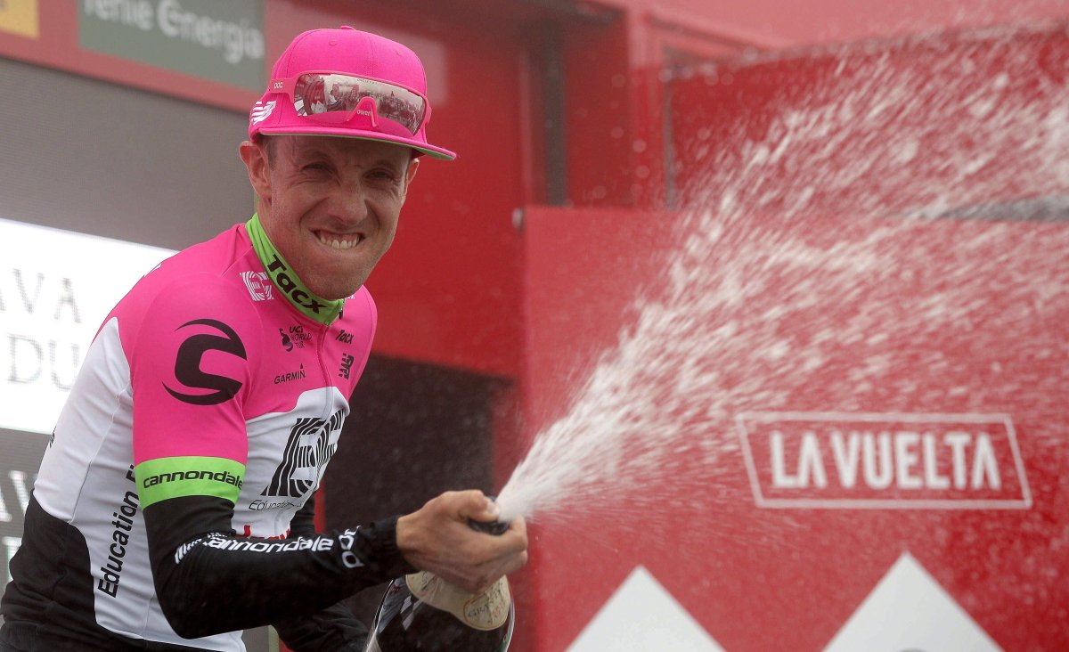 epa07015578 Canadian rider Michael Woods, of Education First team, celebrates on the podium after winning the 17th stage of the 2018 La Vuelta cycling tour, over 157 km from Getxo to Mount Oiz, Basque Country, northern Spain, 12 September 2018.  EPA/Manuel Bruque.