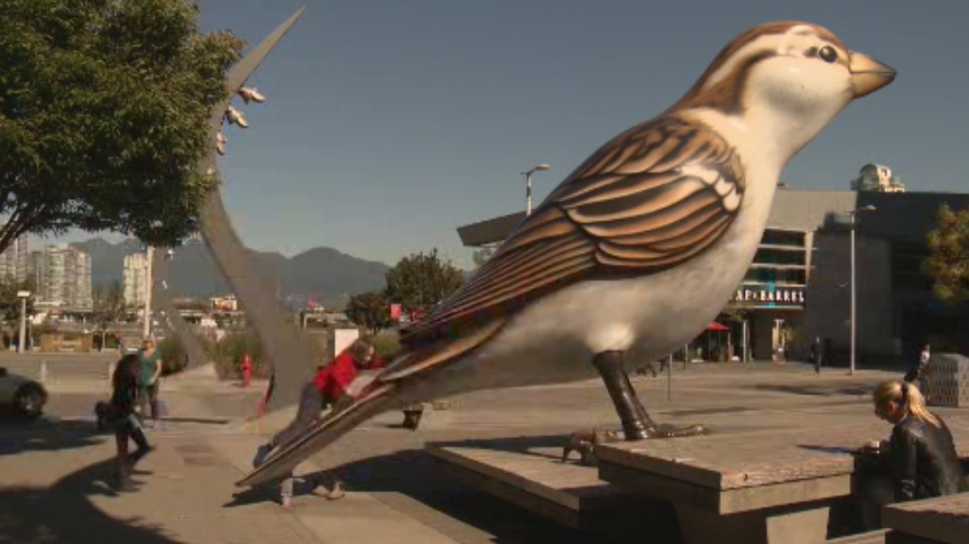 The Olympic Village square that houses these popular bird sculptures has been renamed Milton Wong Plaza.