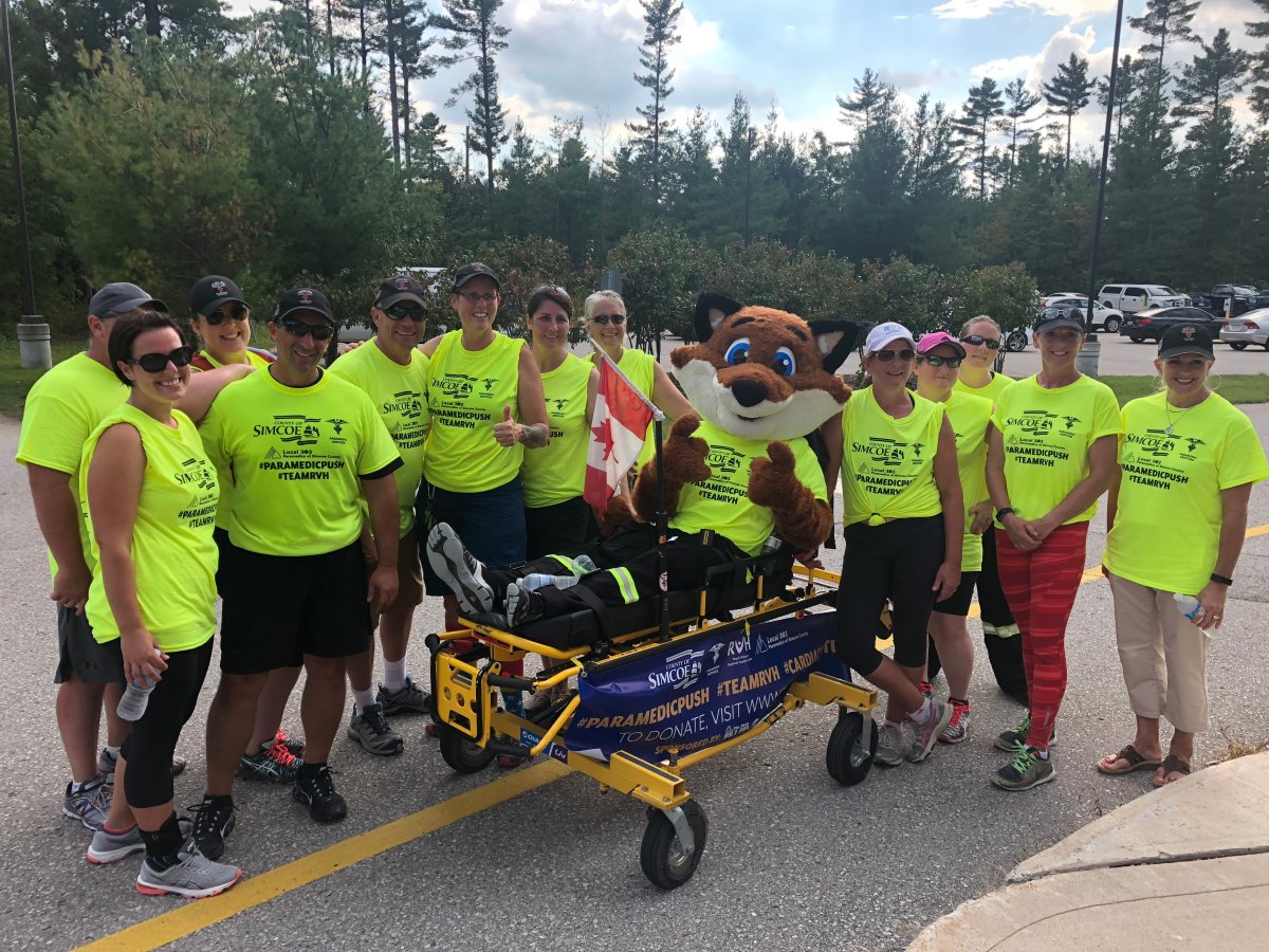 A group of Simcoe County Paramedics pushed a stretcher more than 30 kilometres from Stayner to Midhurst to raise awareness and funds for cardiac care. 