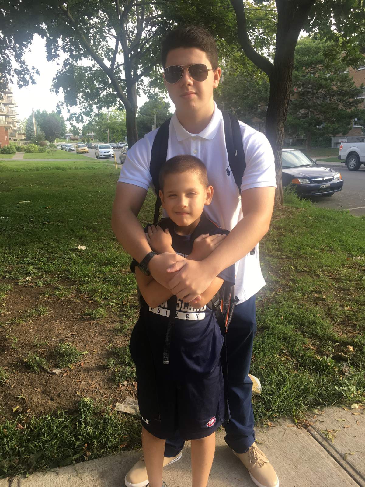 Sixteen-year-old Adam Mitchell and his 9-year-old brother, Devin.