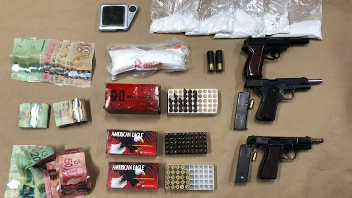 A number of weapons, including two pistols, along with drugs were seized in a Prince Albert, Sask. bust on Sept. 14, 2018.