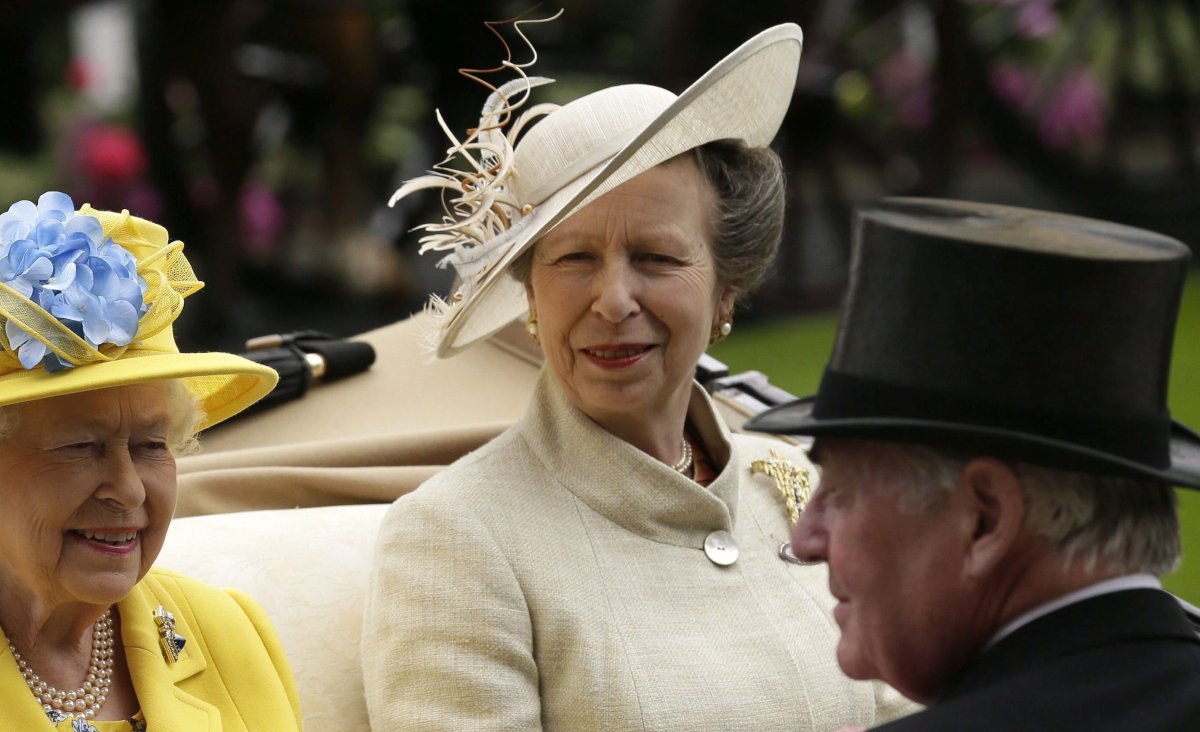 Britain's Queen Elizabeth II arrives at the parade ring with Anne, Princess Royal, in a horse drawn carriage, on the first day of the Royal Ascot horse race meeting in Ascot, England, Tuesday, June 19, 2018. 