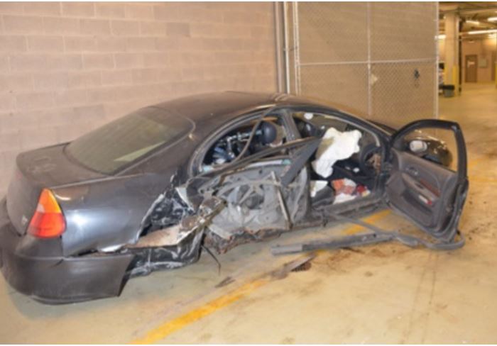 Kingston police released a photo of the car they say a man crashed into a lamp post, and then used to flee police.