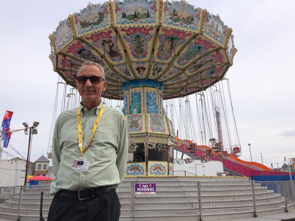 Scooter Korek of North American Midway Entertainment stands in front of his favourite ride, the Wave Swinger.