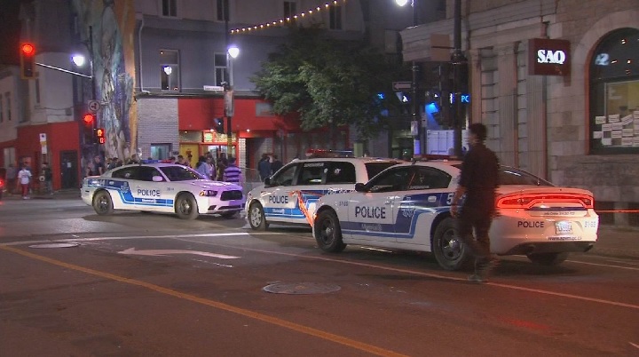 Montreal police investigate an overnight shooting on St-Laurent Boulevard. Sunday, Sept. 16, 2018.