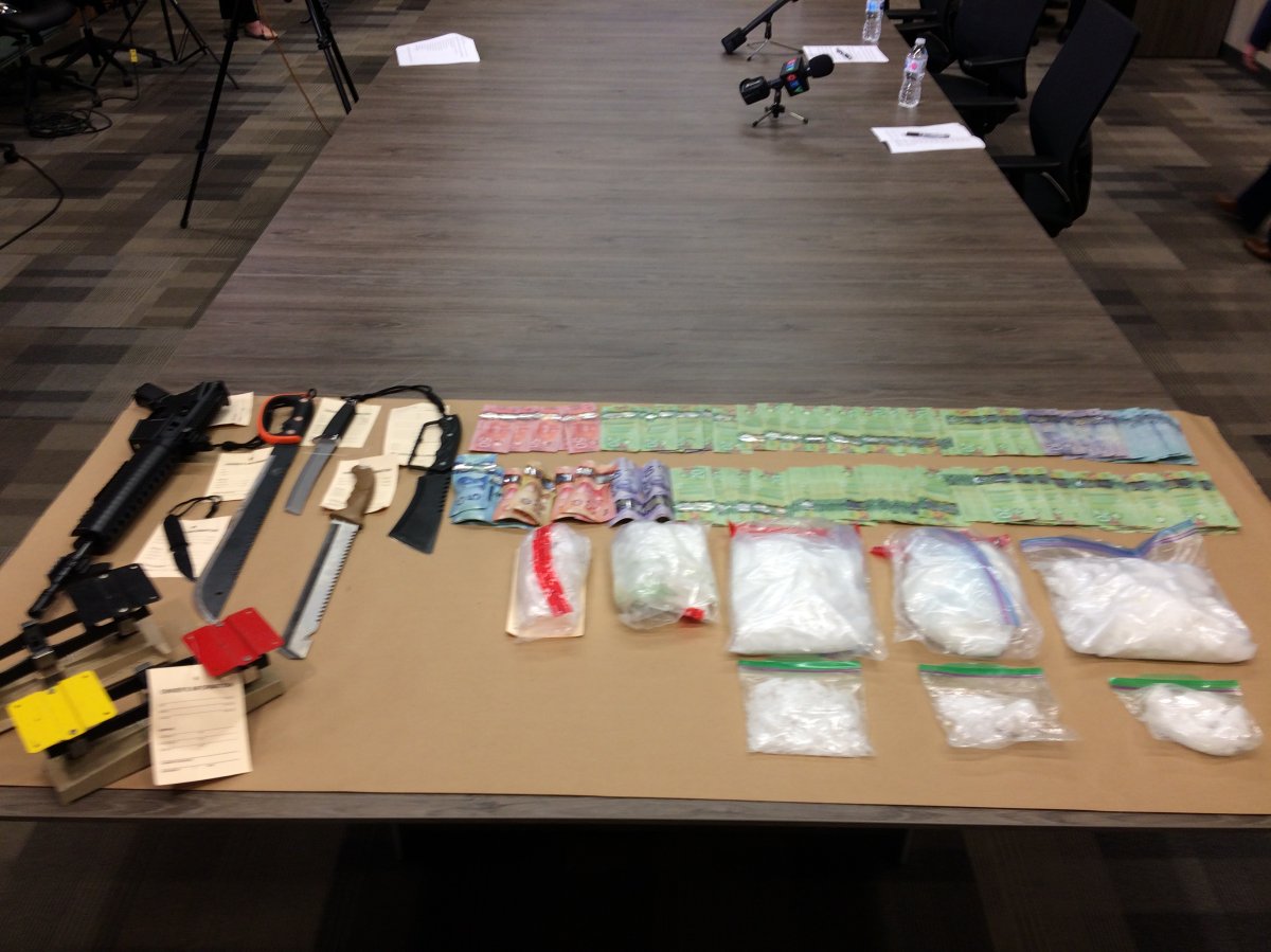 During a news conference on Tuesday, September 25, 2018, members of St. Thomas police showcased various weapons, cash, and drugs seized during the largest drug project the force has ever organized. 