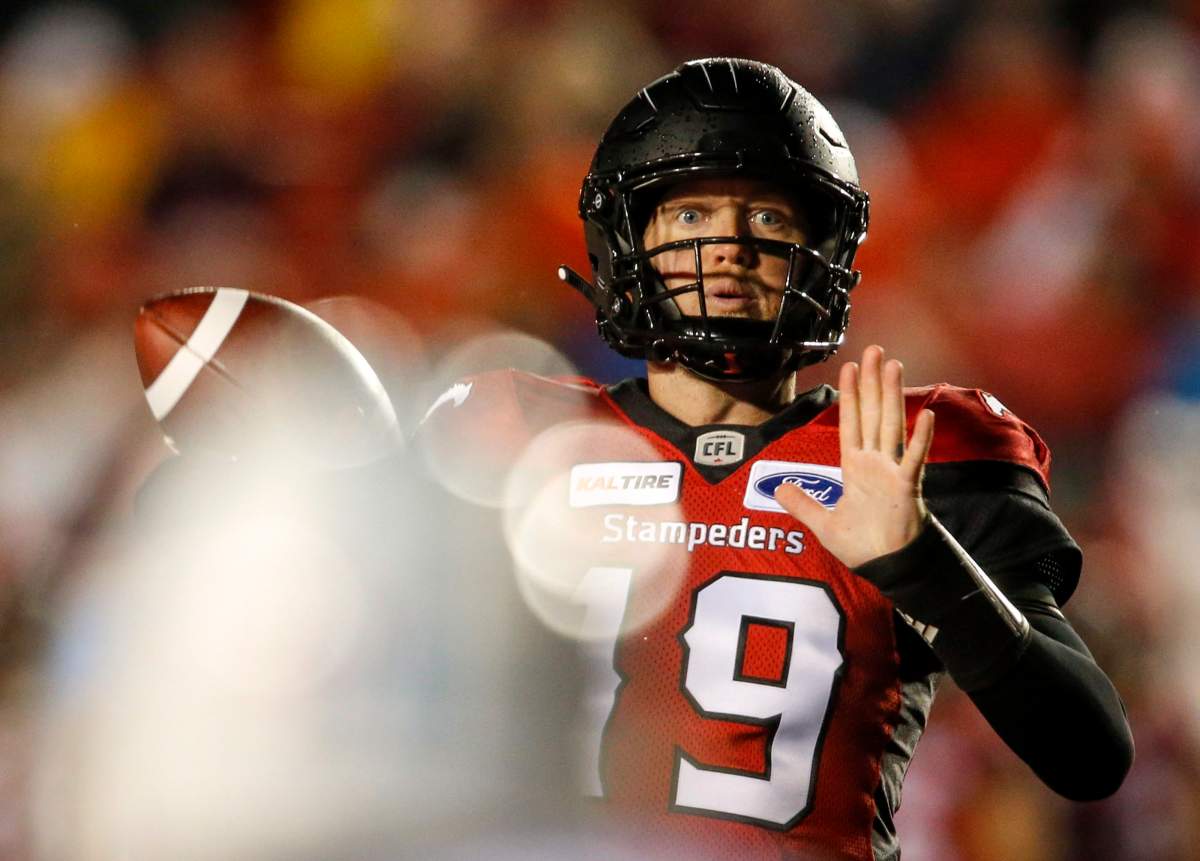 Calgary Stampeders quarterback Bo Levi Mitchell throws the ball during CFL football action against the Toronto Argonauts in Calgary, Friday, Sept. 28, 2018.THE CANADIAN PRESS/Jeff McIntosh.