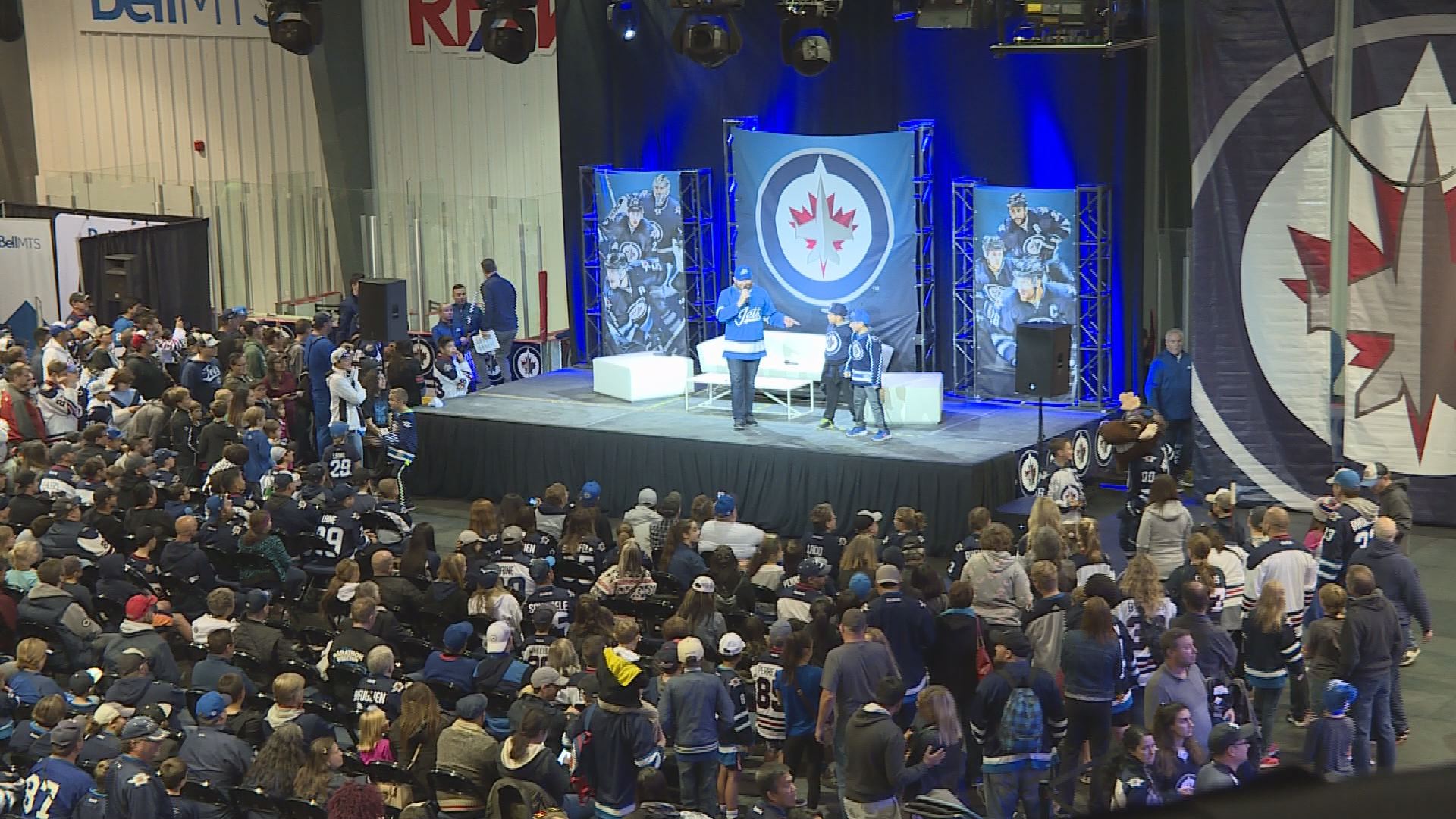 Winnipeg Jets fans cheer during the second period of NHL hockey game action  against the St. Lou …