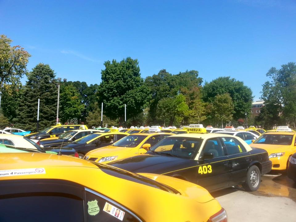 Taxis seen parked outside of Victoria Park in November 2015. The London Taxi Association was offering veterans free rides to and from the cenotaph for Nov. 11 ceremonies.