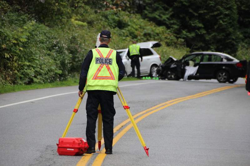 Collision investigators on the scene of a fatal crash in Chilliwack, B.C., on Saturday morning. 