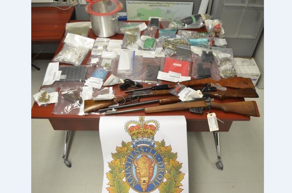 New Brunswick RCMP seized six firearms -- three of which were loaded -- contraband cigarettes, a portable hash oil extractor and a quantity of drugs believed to be cocaine and marijuana.