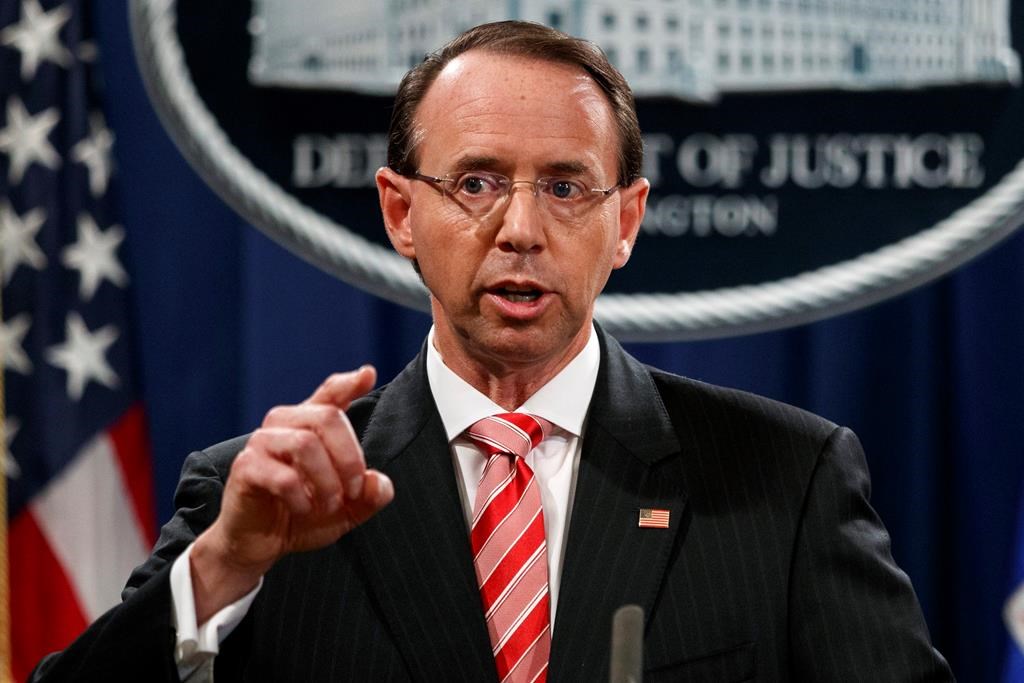 FILE - In this July 13, 2018, file photo, Deputy Attorney General Rod Rosenstein speaks during a news conference at the Department of Justice in Washington.