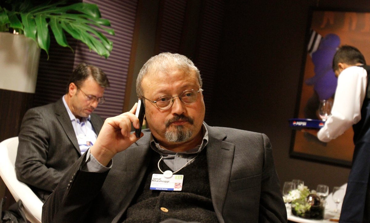 FILE - Saudi Arabian journalist Jamal Khashoggi speaks on his cellphone at the World Economic Forum in Davos, Switzerland on Saturday, Jan. 29, 2011.