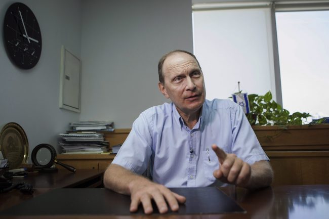 Dr. Leonid Eidelman speaks during an interview with The Associated Press at his office in Ramat Gan, Israel, June 19, 2014. The Canadian Medical Association has accused the incoming president of the World Medical Association of plagiarizing his inaugural speech.