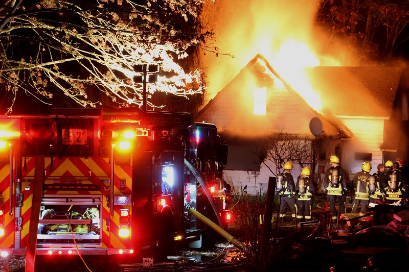 Fire destroys house in Surrey - image