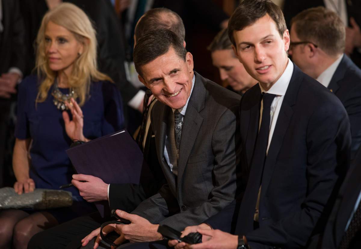 Former national security adviser Michael Flynn (C) flanked by Kellyanne Conway (L) and Jared Kushner (R) attends a press conference with U.S. President Donald J. Trump.