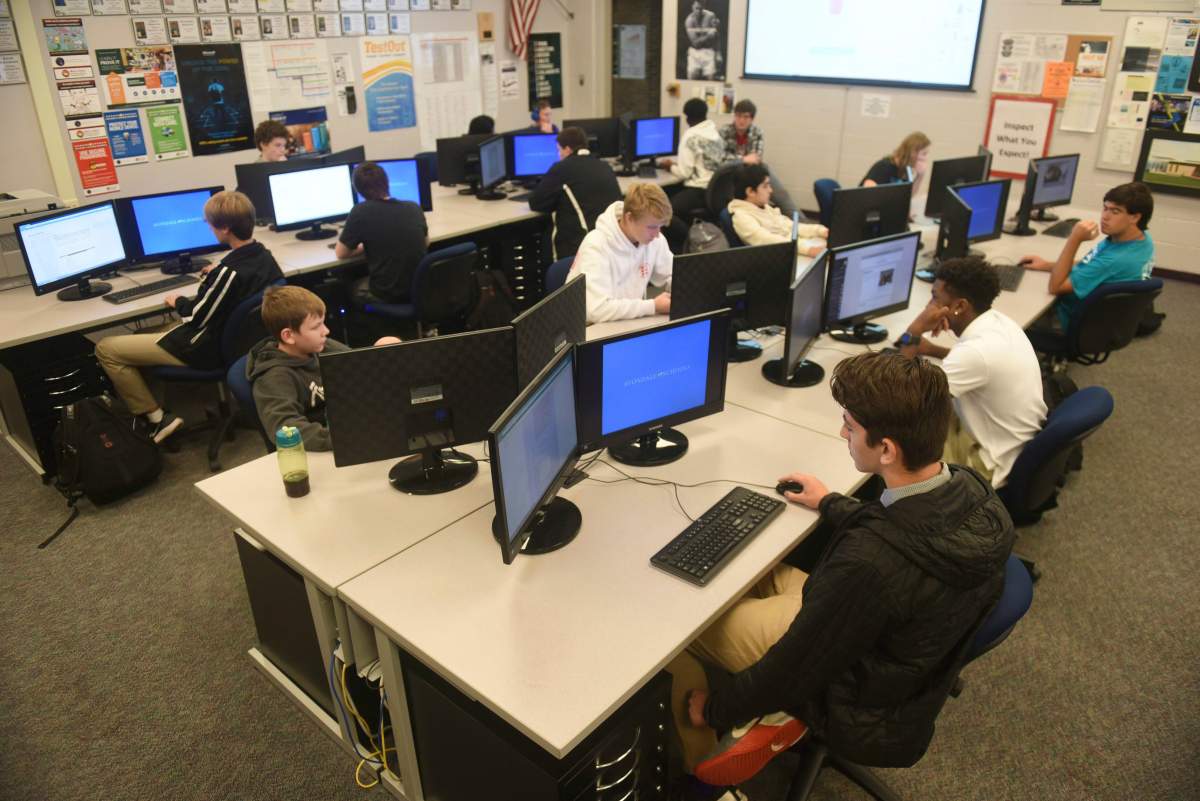 In this Oct. 13, 2017 photo, Avondale High School students attend the computer science programming class at the Auburn Hills campus in Auburn Hills, Mich.