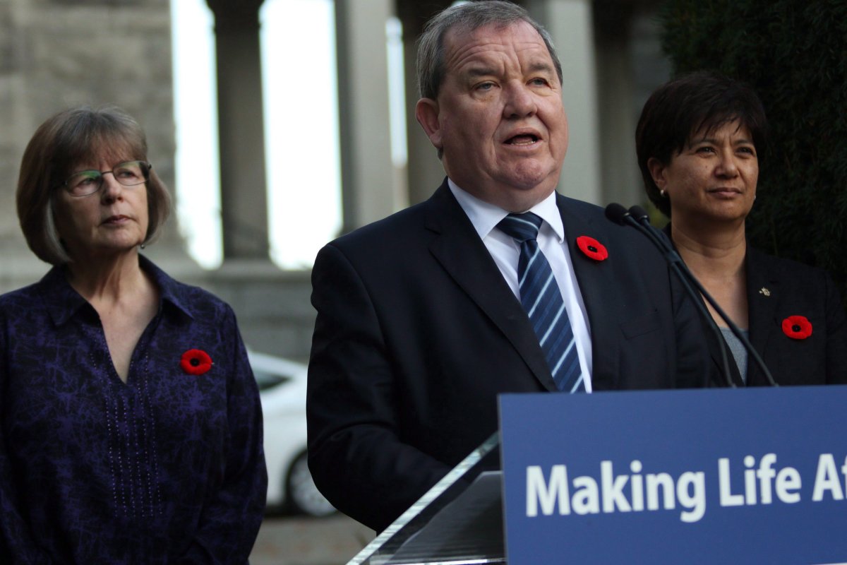 Minister of Social Development and Poverty Reduction Shane Simpson is joined by UNBC chair Dawn Hemingway, (left), and Parliamentary Secretary and co-chair Mable Elmore as they discuss details of an advisory forum on poverty reduction during a press conference from the Rose Garden at Legislature in Victoria, B.C., on Monday, Oct. 30, 2017. 