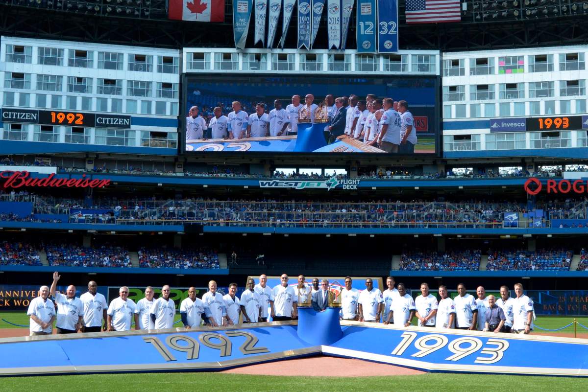 Members of the 1992 and 1993 World Series-winning Toronto Blue Jays teams are recognized on the 25th anniversary of their back-to-back championships before the game against the Tampa Bay Rays at Rogers Centre Saturday August 11, 2018 in Toronto. 