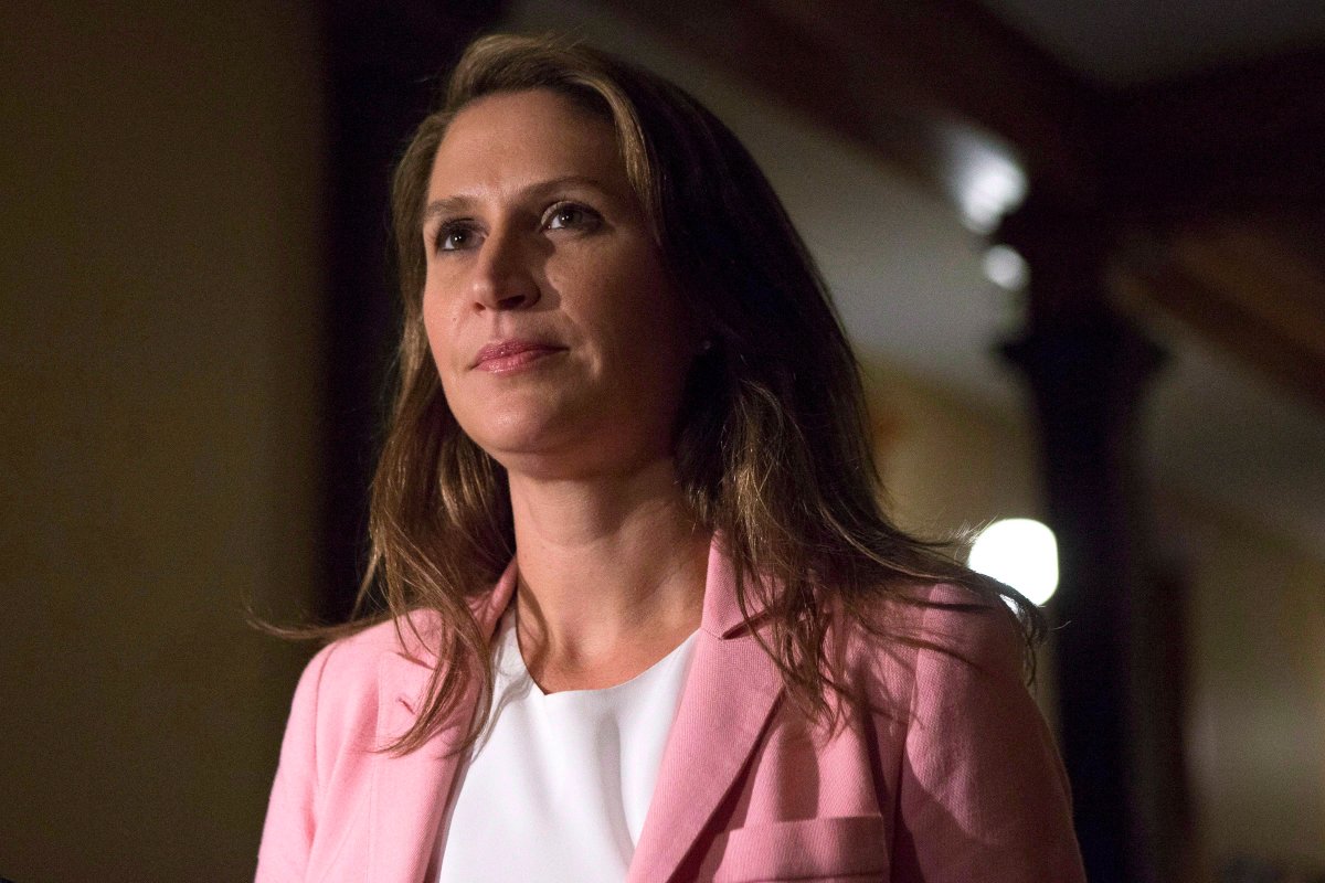 Caroline Mulroney, attorney general of Ontario walks away after scrumming with reporters after question period at the Ontario Legislature in Toronto, on Wednesday, Sept. 12, 2018. 