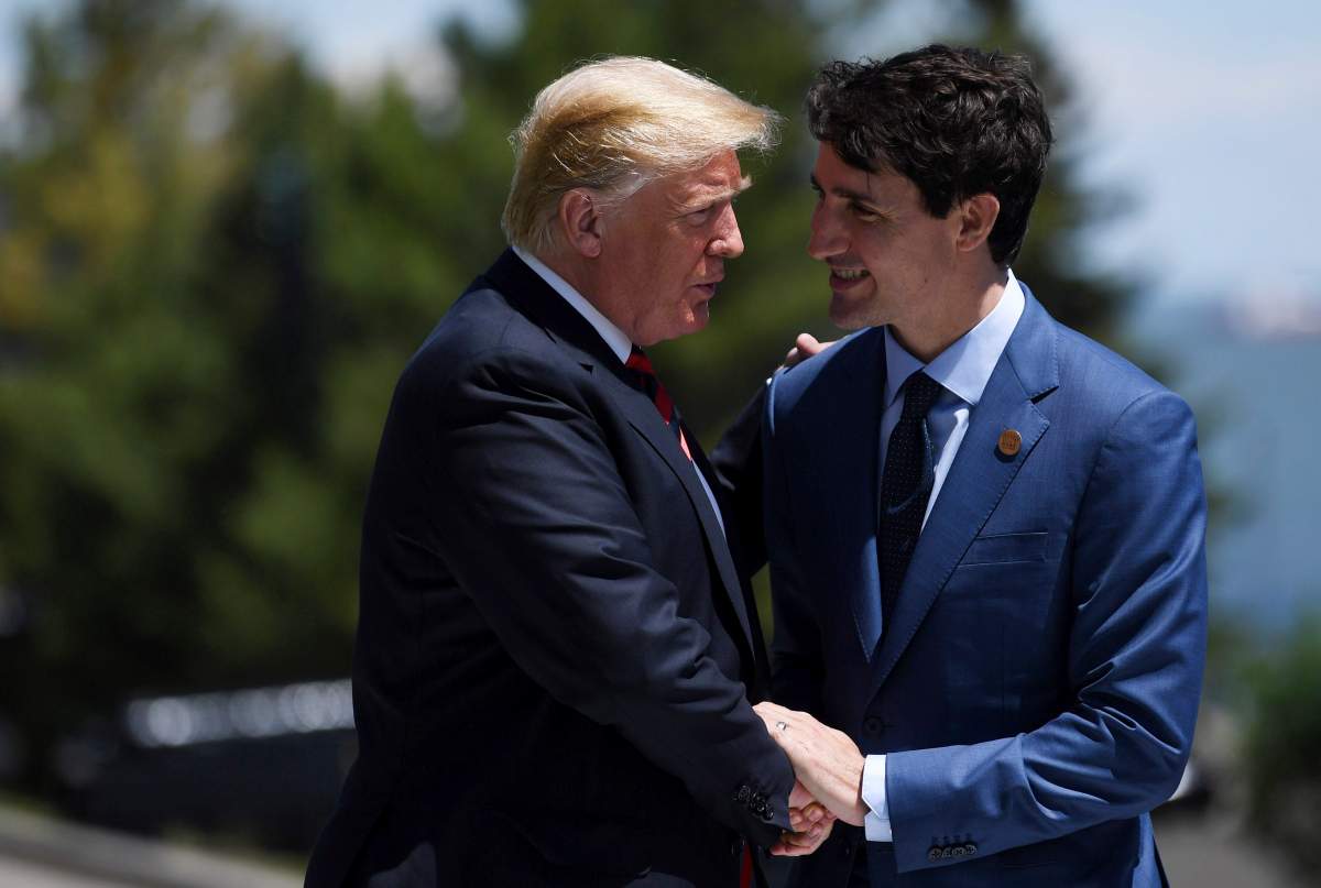 U.S. President Donald J. Trump (L) and Canada’s Prime Minister Justin Trudeau (R) shake hands during the Welcome Ceremony at the G7 summit in Charlevoix, Canada, 08 June 2018.