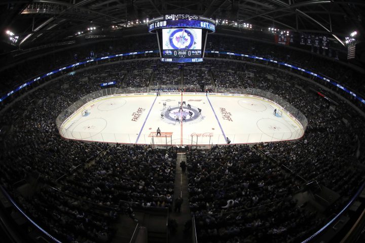 Opening puck drop between the Winnipeg Jets and Los Angeles Kings NHL hockey action in Winnipeg, Tuesday, October 9, 2018.