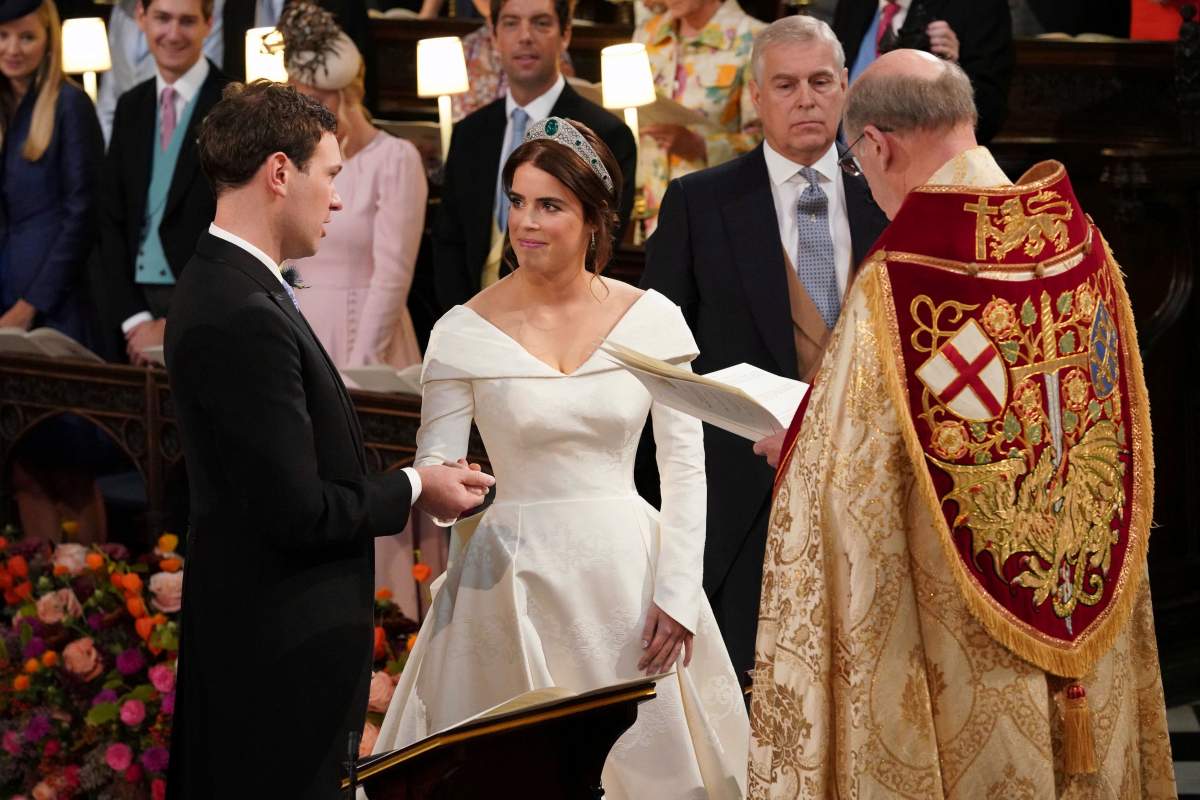 The Rt Revd David Conner, Dean of Windsor conducts the wedding ceremony between Princess Eugenie of York and Jack Brooksbank in St GeorgeÄôs Chapel, Windsor Castle, near London, England, Friday Oct. 12, 2018.
