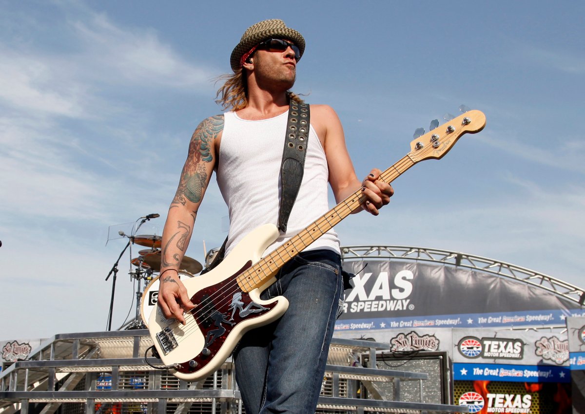 In this April 9, 2011 file photo, then-3 Doors Down bassist Todd Harrell performs before a NASCAR auto race at Texas Motor Speedway in Fort Worth, Texas. 