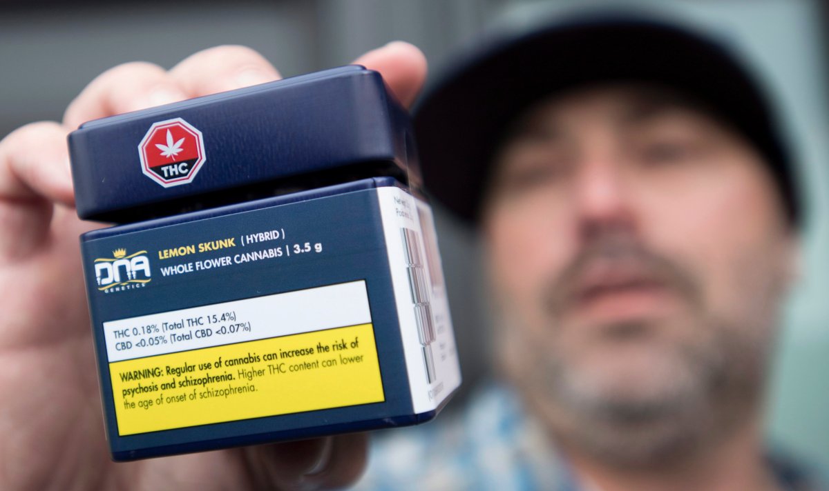 Aaron shows off his cannabis purchase outside British Columbia's first legal B.C. cannabis store in Kamloops, B.C. Wednesday, Oct. 17, 2018.