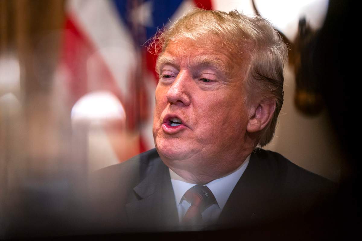 U.S. President Donald J. Trump speaks to the media before meeting with senior military advisors in the Cabinet Room of the White House in Washington, DC, USA, 23 October 2018.