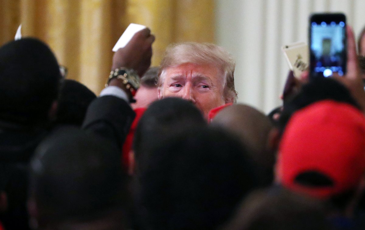 U.S. President Donald Trump greets attendees after delivering remarks at the "2018 Young Black Leadership Summit," in the East Room of the White House in Washington, U.S., October 26, 2018. 