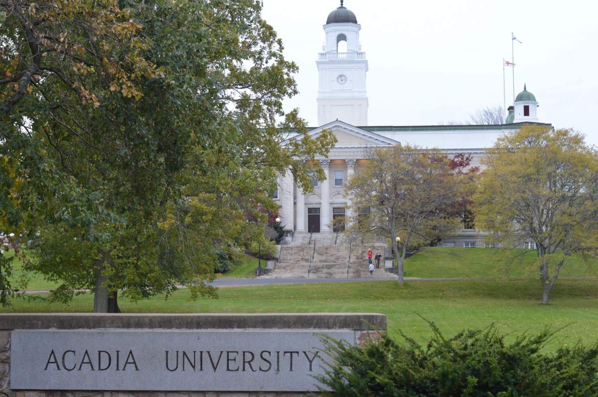 RCMP said "numerous" charges were laid after unsanctioned Acadia University homecoming parties spilled out into the streets around the school. 