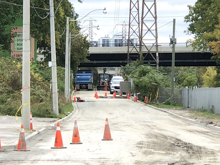 Crews can be seen repairing after a water main break has closed down Bayview Avenue for the weekend.