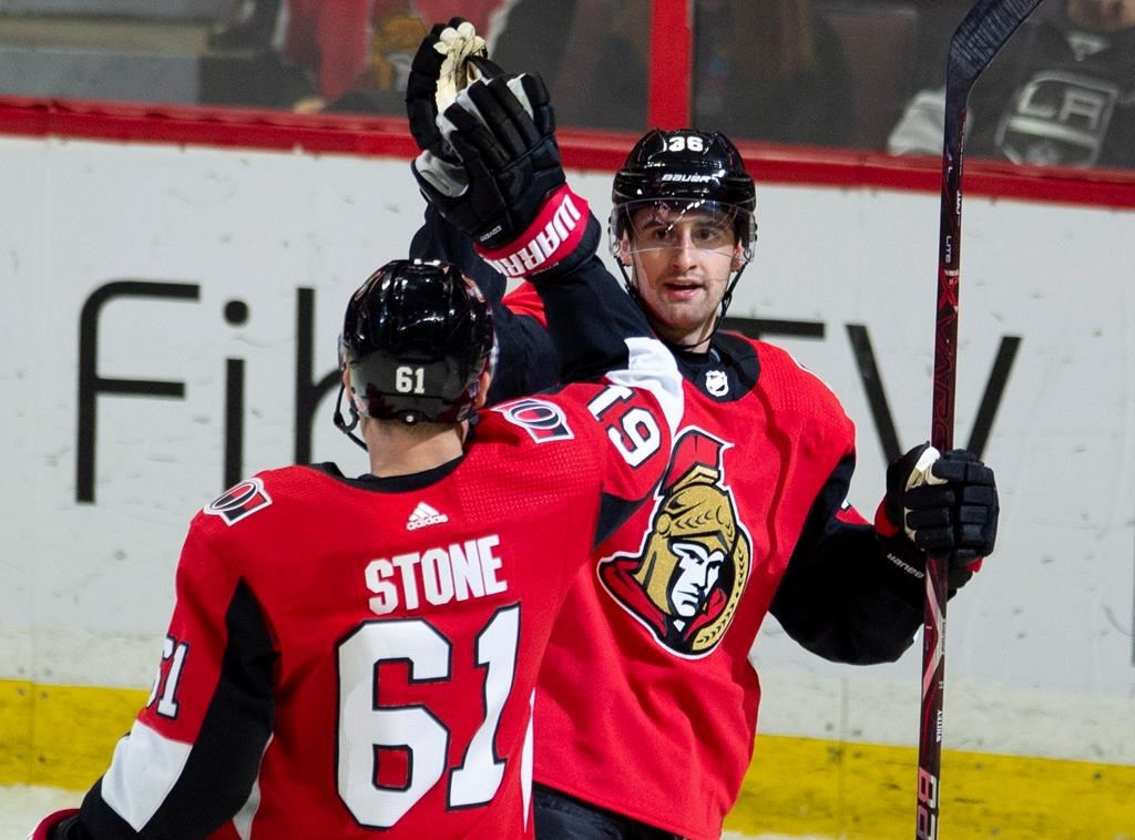 Ottawa Senators centre Colin White (36) celebrates his goal with teammate right wing Mark Stone (61) during second period NHL action against the Los Angeles Kings in Ottawa on Saturday, October 13, 2018.