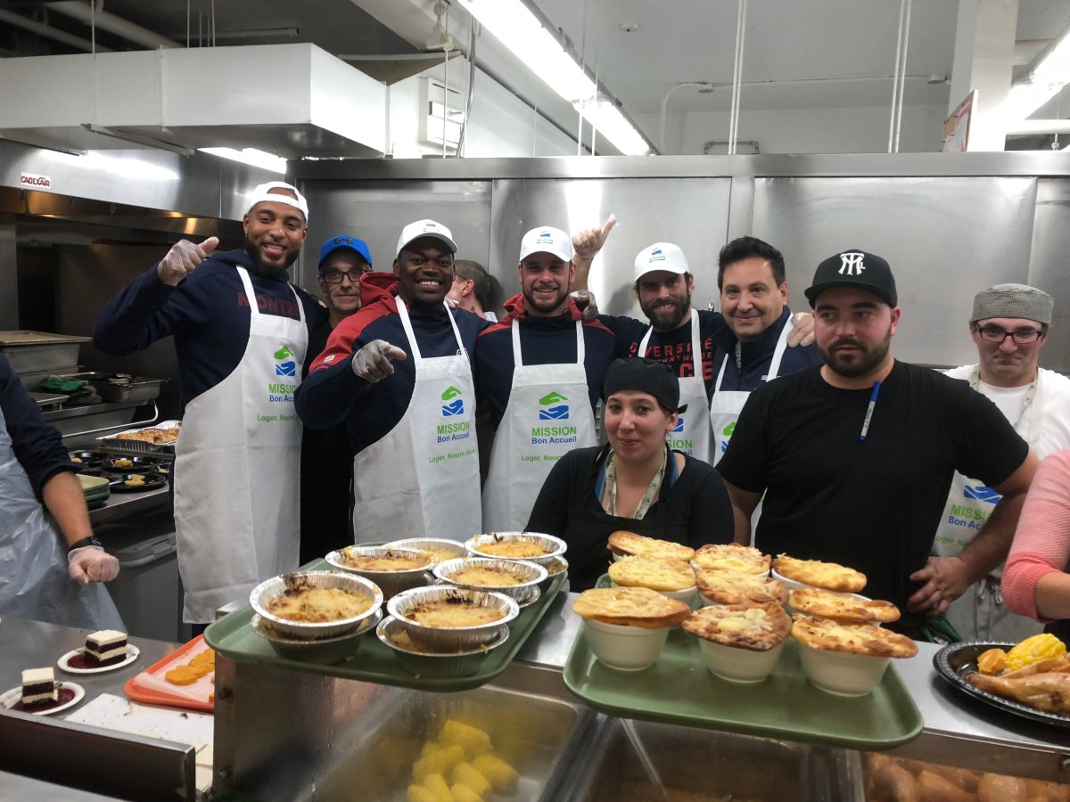 Montreal Alouettes players in the Welcome Hall Mission kitchen, Monday, October 8, 2018.