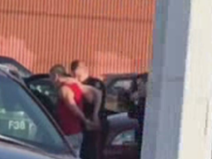 A witness took video of a man in a red tank top being arrested in the area of 118 Avenue and 97 Street in Edmonton on Friday afternoon. Police have confirmed that’s where officers arrested a suspect in the abduction of a high school student earlier in the afternoon.