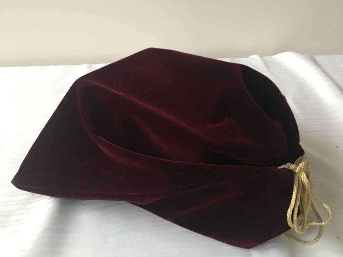 RCMP say an urn containing a family member’s ashes in a purple bag was taken when a home was broken into in Okotoks Thursday. 