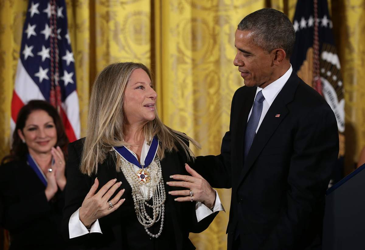 Former U.S. President, Barack Obama, presents the Presidential Medal of Freedom to Barbra Streisand on Nov. 24, 2015, at the White House in Washington, D.C.
