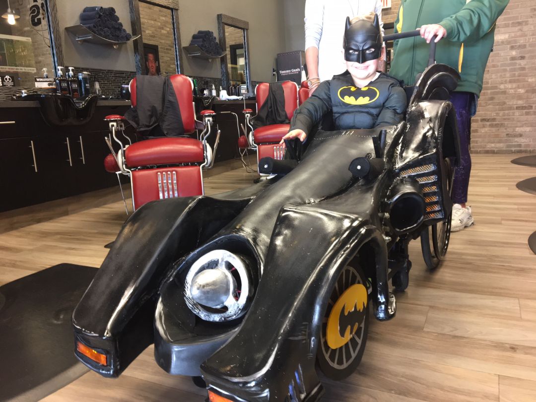 Barber helps transform Alberta boy's wheelchair into Batmobile for  Halloween 