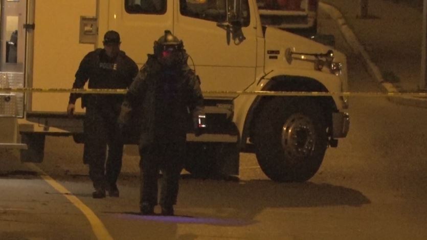 A member of the RCMP Explosives Disposal Unit arrives at a Nanaimo tent city on Friday night.